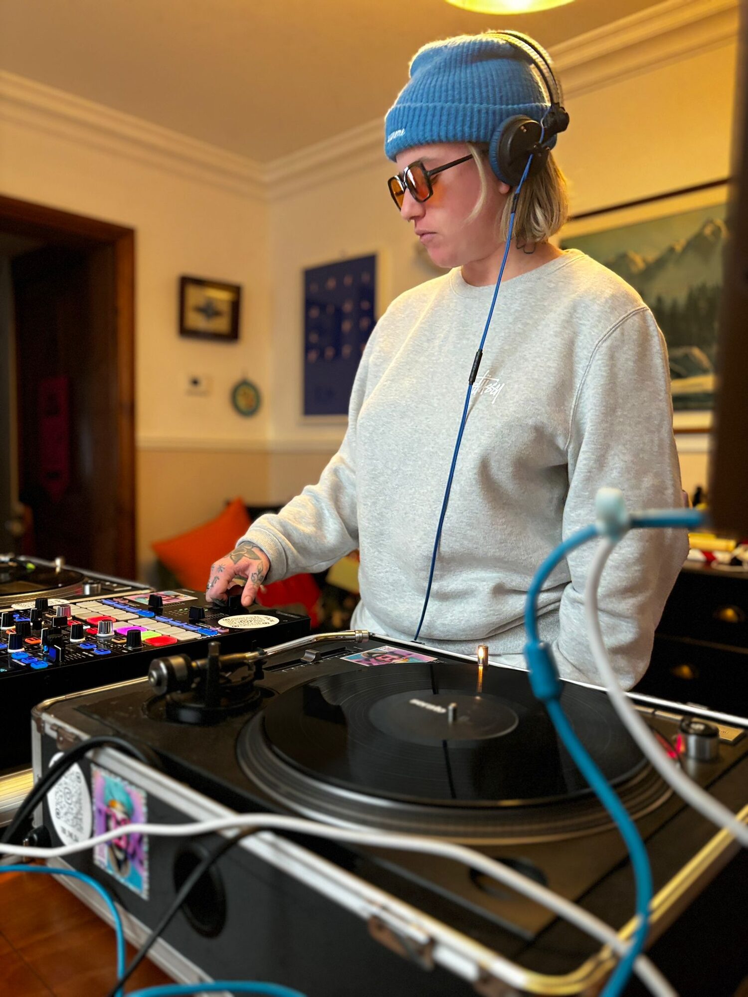 Abbie Neill DJing on turntables