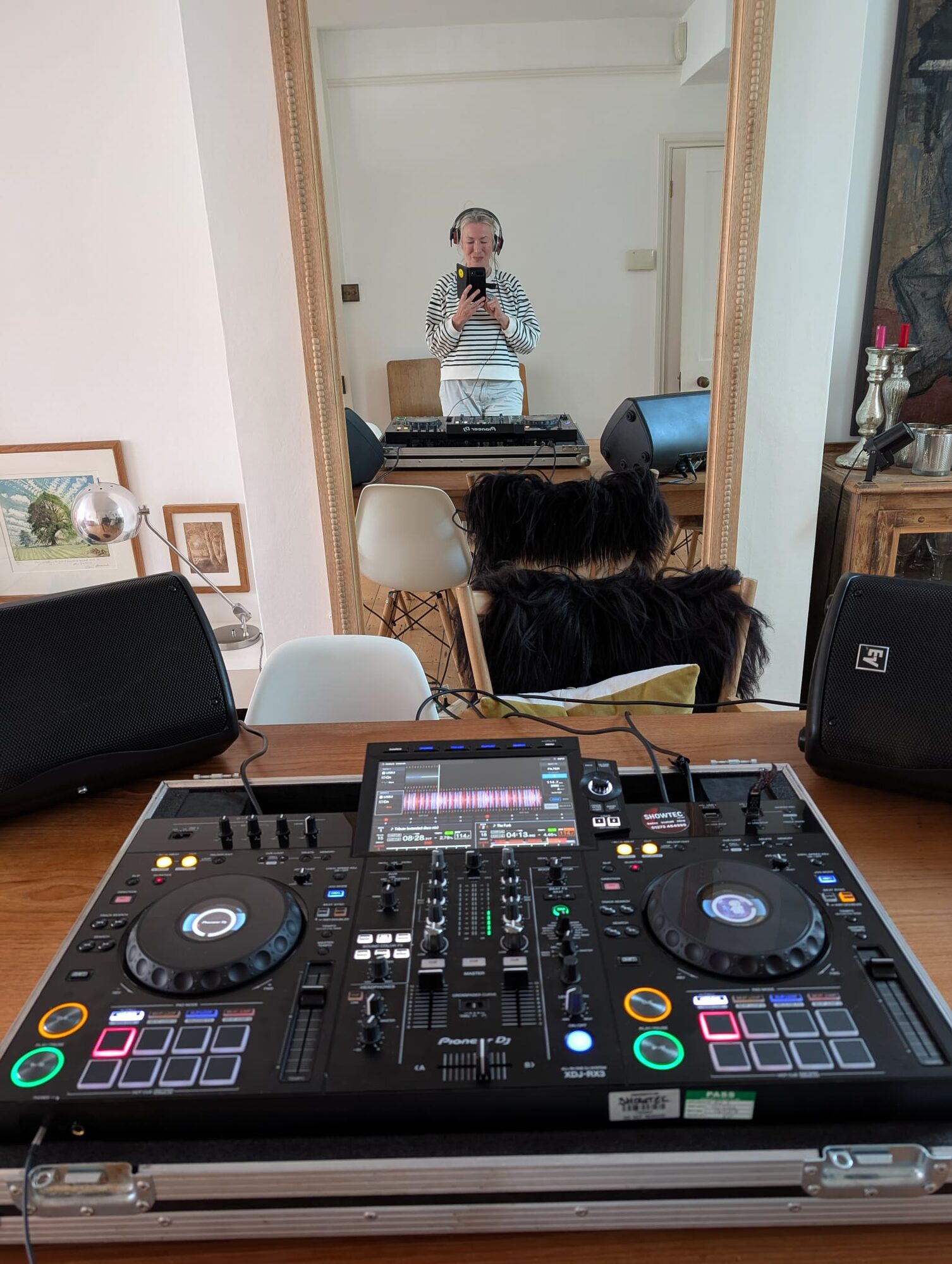 Camilla DJing on decks at home